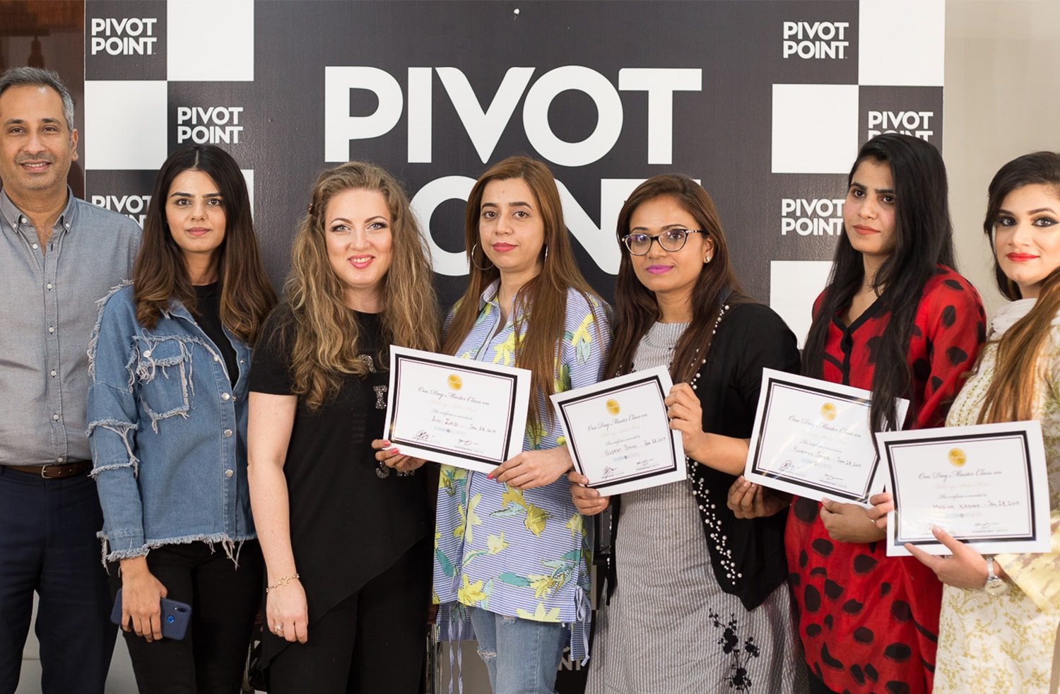 Graduates with certificates after the masterclass by Zeena Feygina