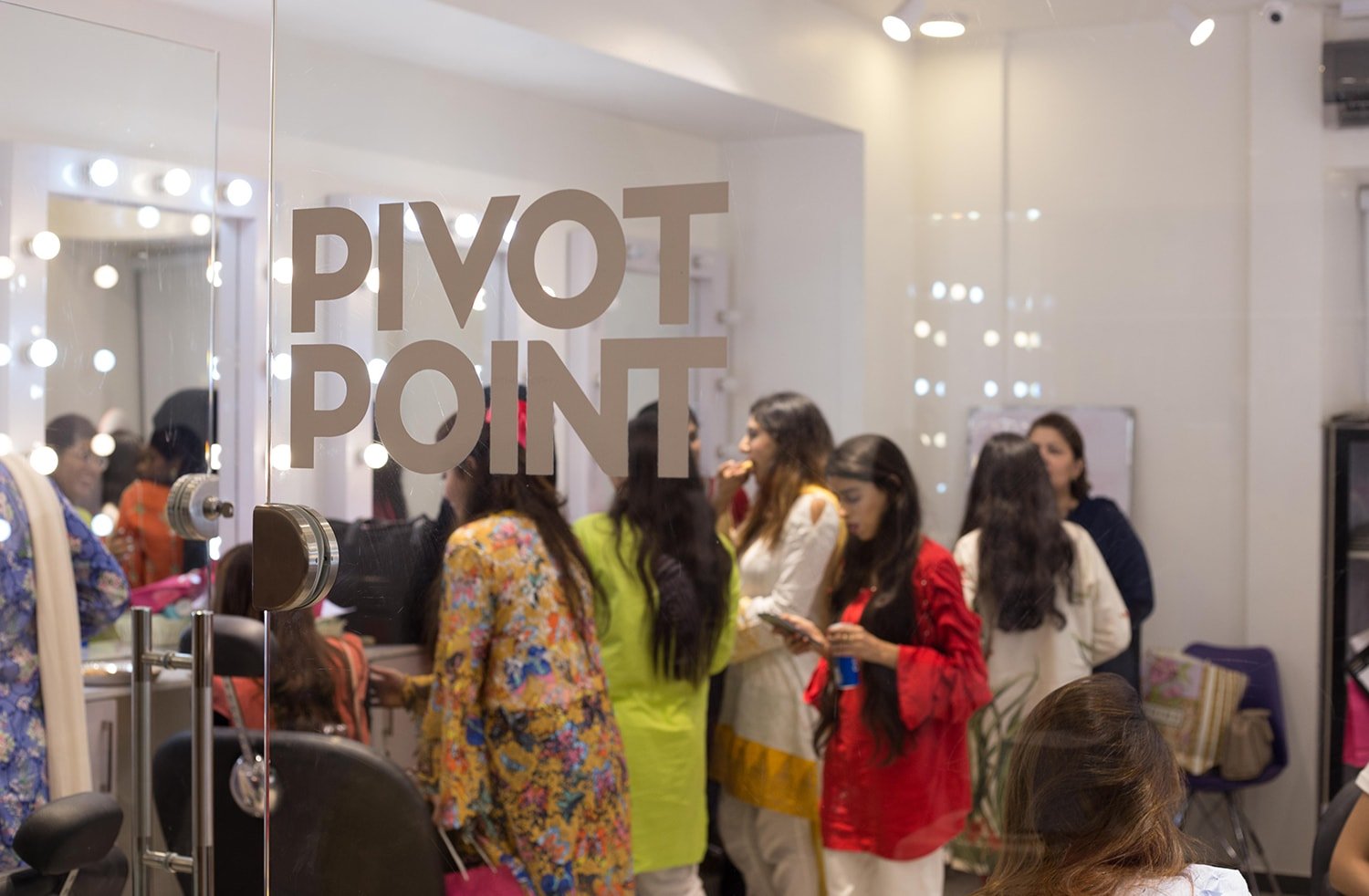Guests at the Truly Komal skincare launch inside the academy